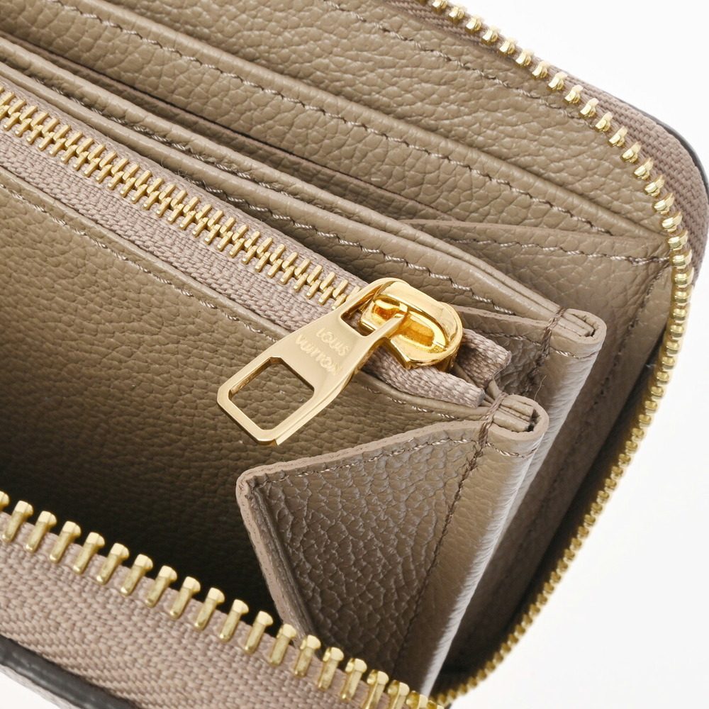 Louis Vuitton Bicolor Empreinte Zippy Wallet Tourtrail Creme Long - Picture 11 of 15